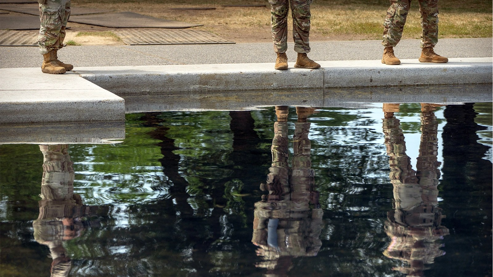 National Guard members stand near the Lincoln Memorial Reflecting Pool on June 22, 2026, in Washington, D.C.