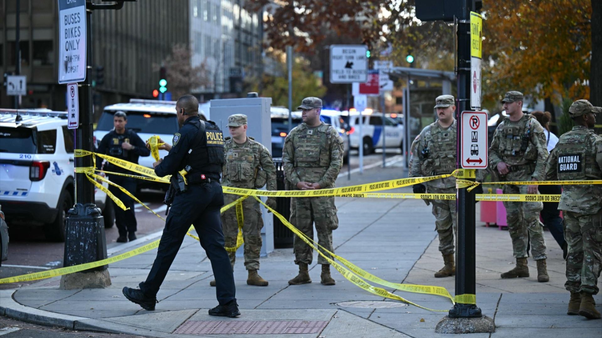 National Guard soldiers gather near a crime scene after a shooting in downtown Washington, D.C., on Nov. 26, 2025. Two members of the National Guard were shot Wednesday just blocks from the White House, according to officials.
