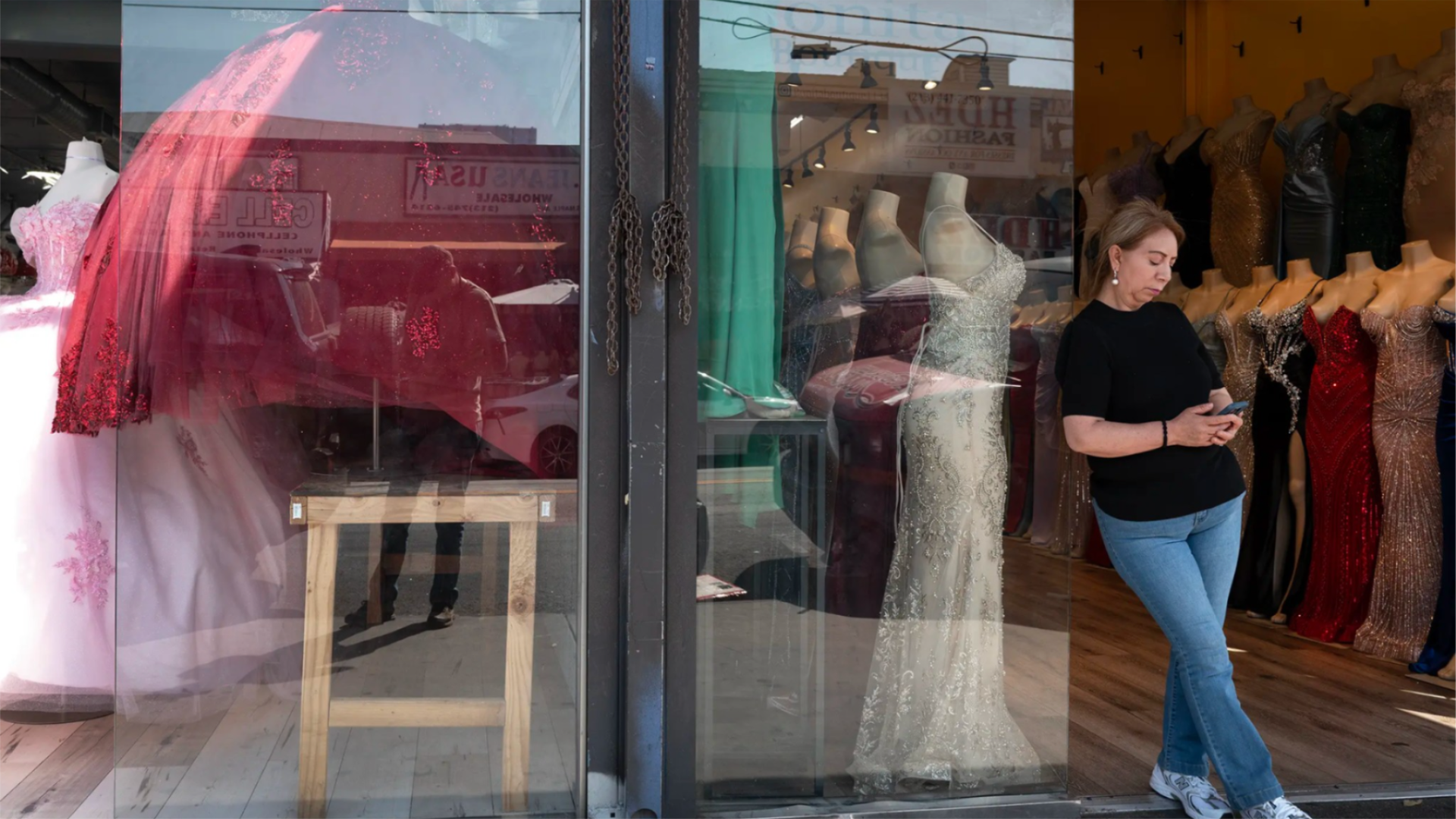A vendor sells merchandise in the Santee Alley area of the Fashion District in Los Angeles