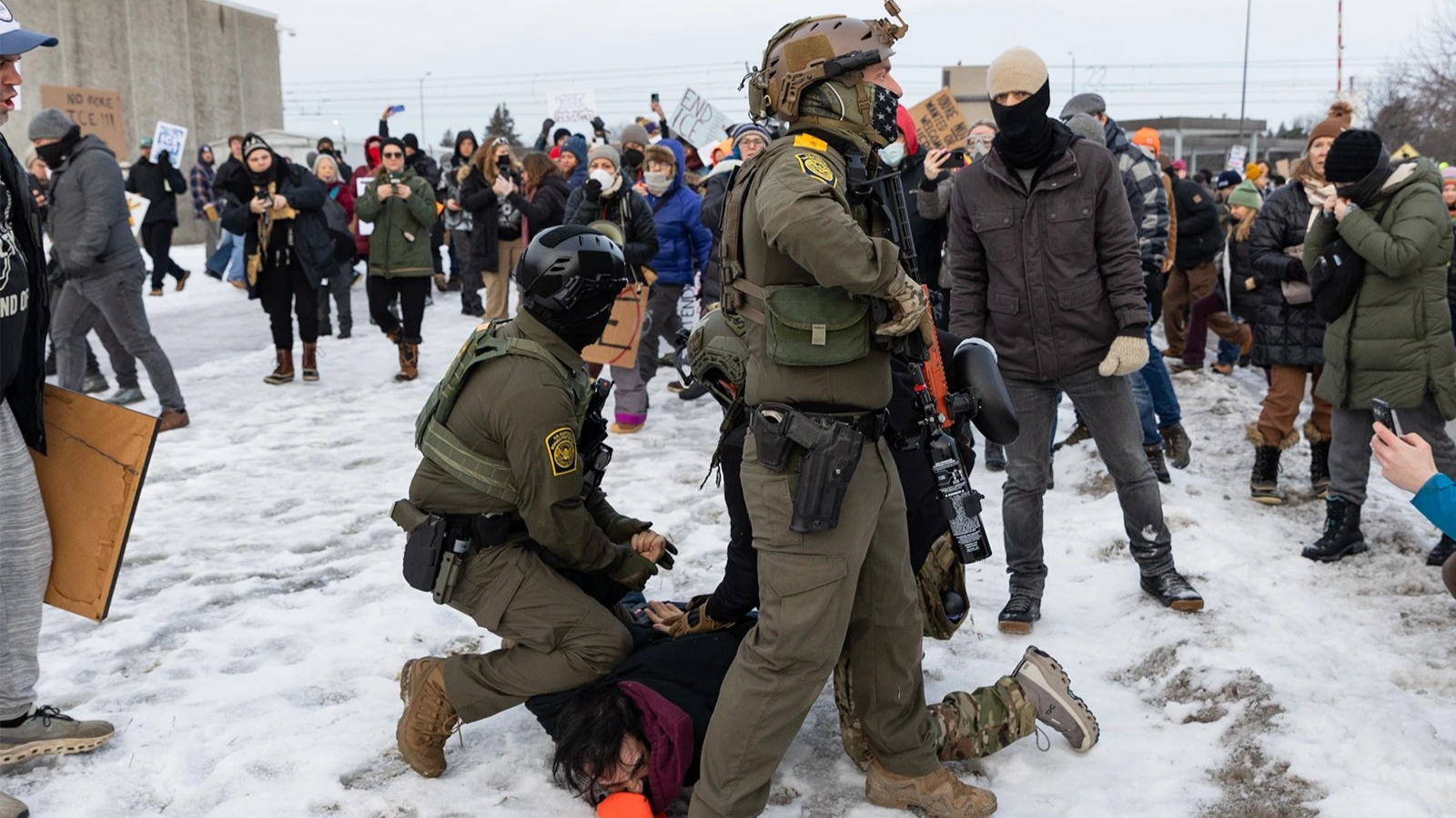 Protesters clash with law enforcement outside an Immigration and Customs Enforcement facility