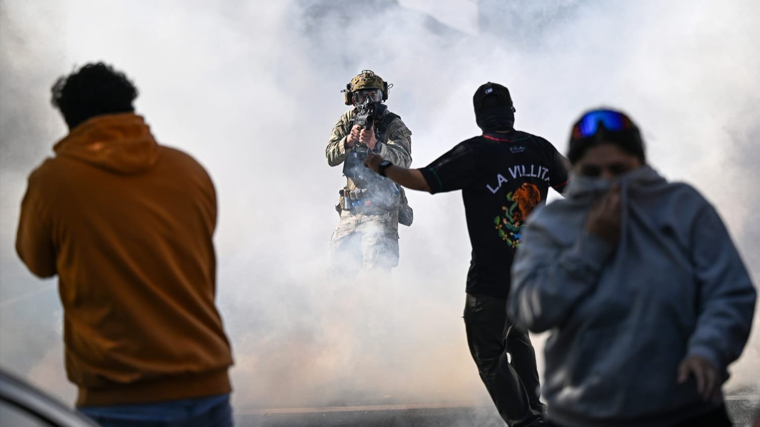 Residents and protesters clash with federal agents in Chicago