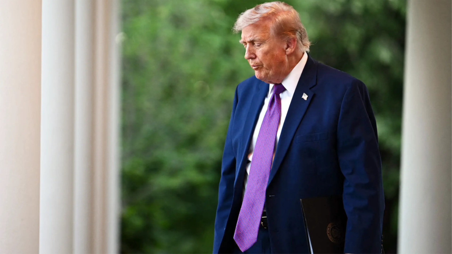 A photo of Trump looking down