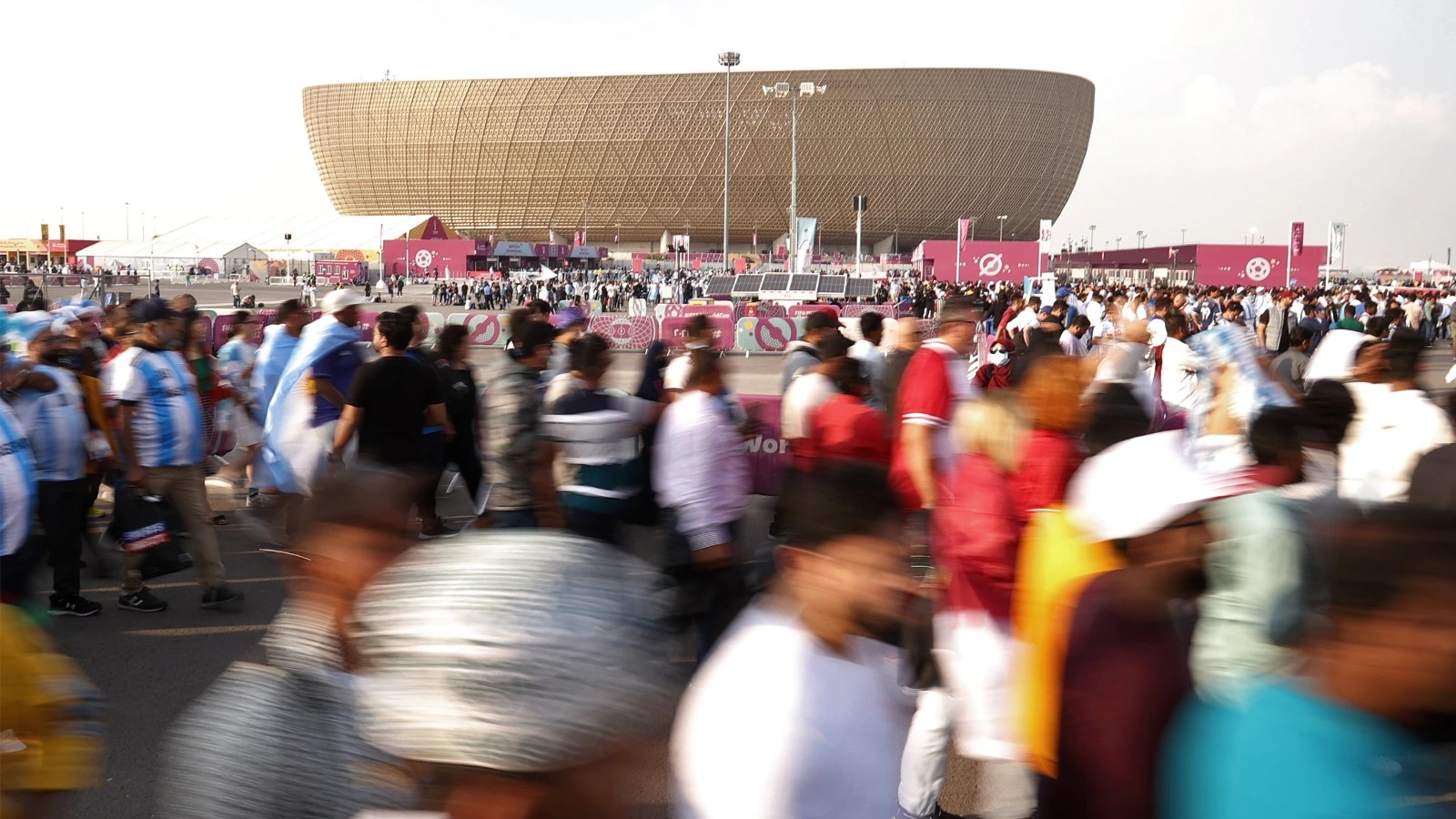 Blurred crowd of people at Lusail Stadium