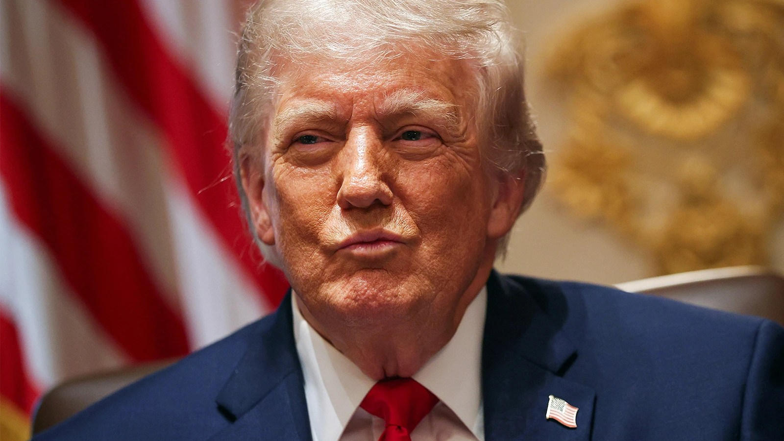 Donald Trump smirks.
