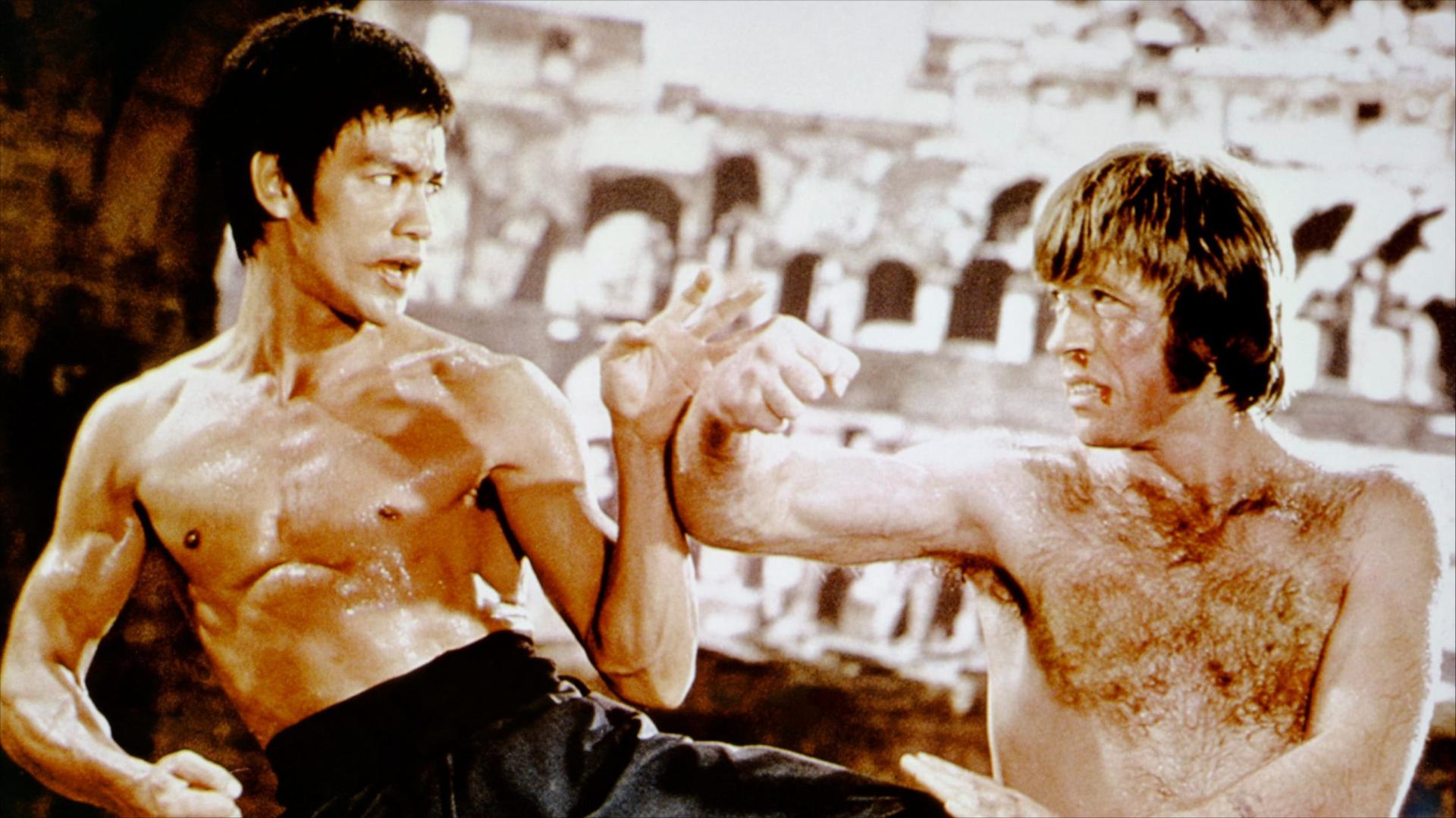 American martial artist Chuck Norris with Chinese American martial artist, actor, director and screenwriter Bruce Lee on the set of the movie Meng Long Guo Jiang (The Way of the Dragon).