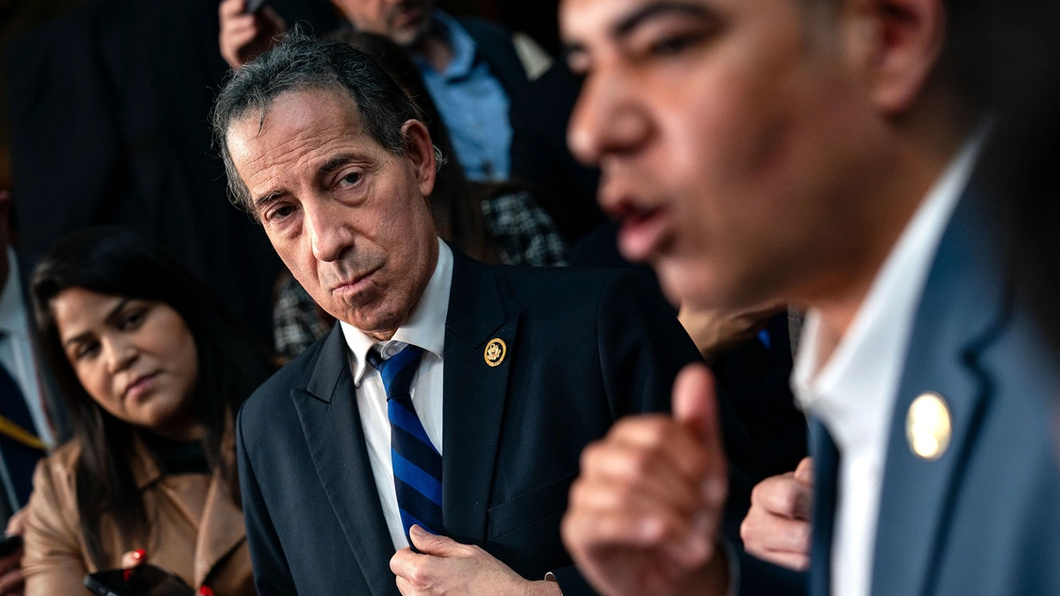 A photo of Rep. Jamie Raskin among House Democrats