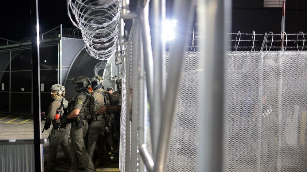 Homeland Security Investigations (HSI) and Immigration and Customs Enforcement (ICE) return back into the Delaney Hall Immigration Detention Center on June 12, 2026 in Newark, N.J.