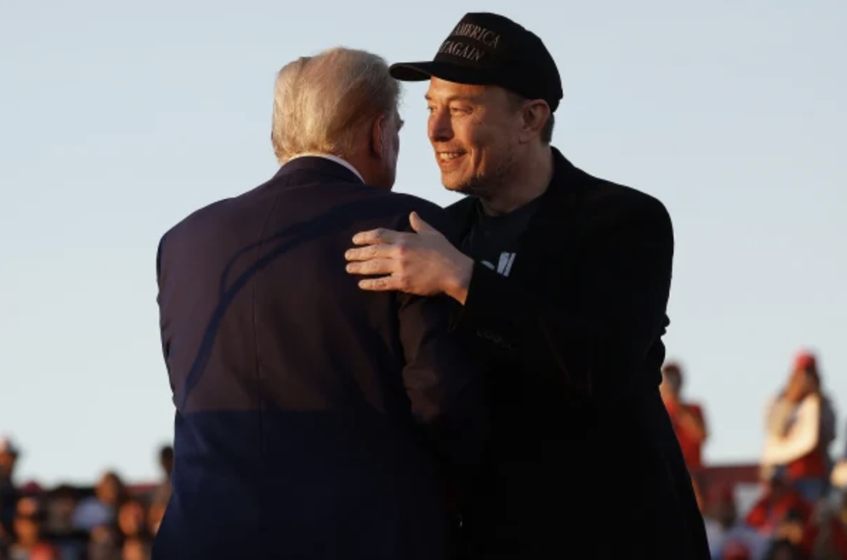 Elon Musk hugging Donald Trump