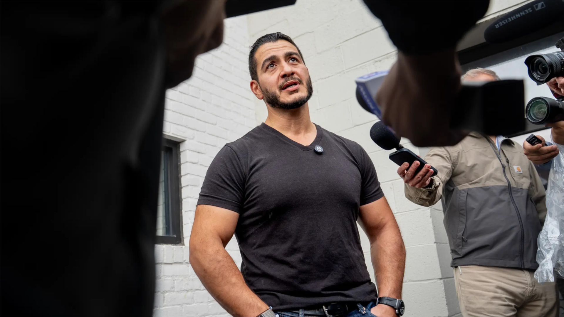 Abdul El-Sayed speaks with reporters