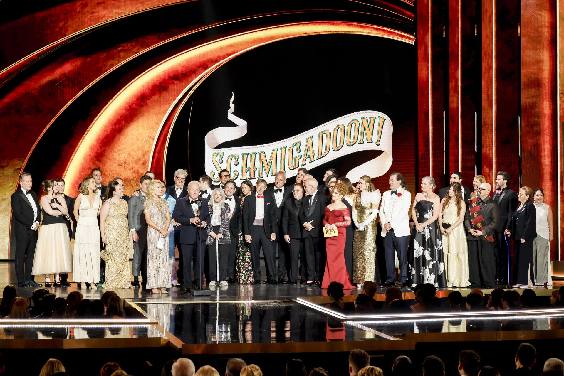 Lorne Michaels and the cast of Schmigadoon! on stage at The 79th Annual Tony Awards.
