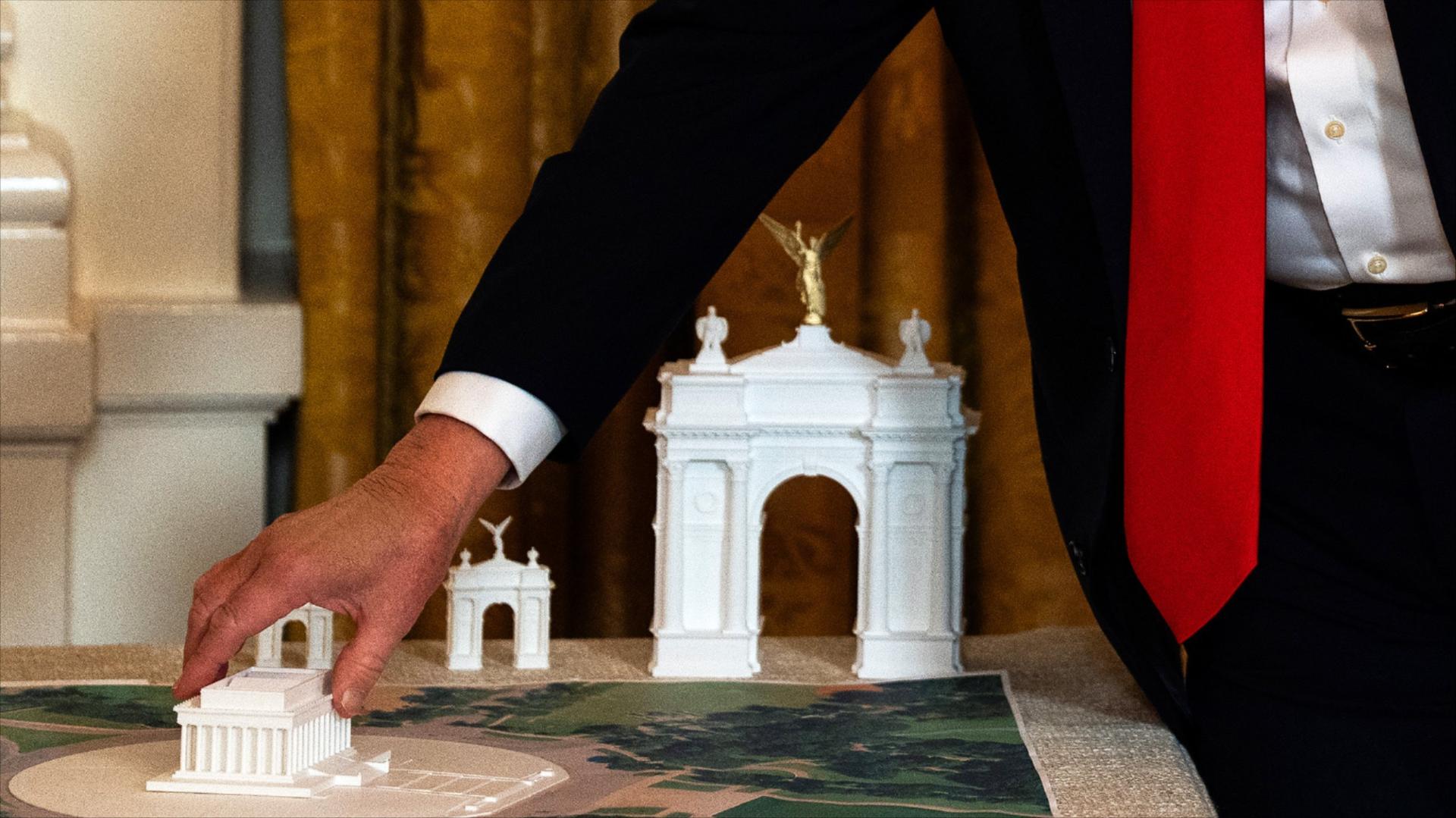 A model of an arch is seen as President Donald Trump delivers remarks during a ballroom fundraising dinner