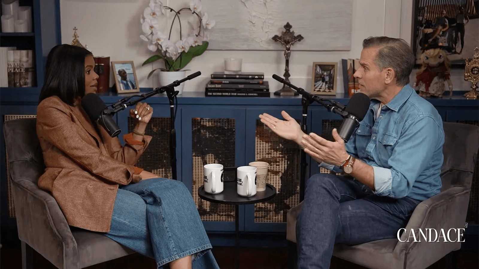 Candace Owens, left, and Hunter Biden speak into microphones while sitting in lounge chairs.