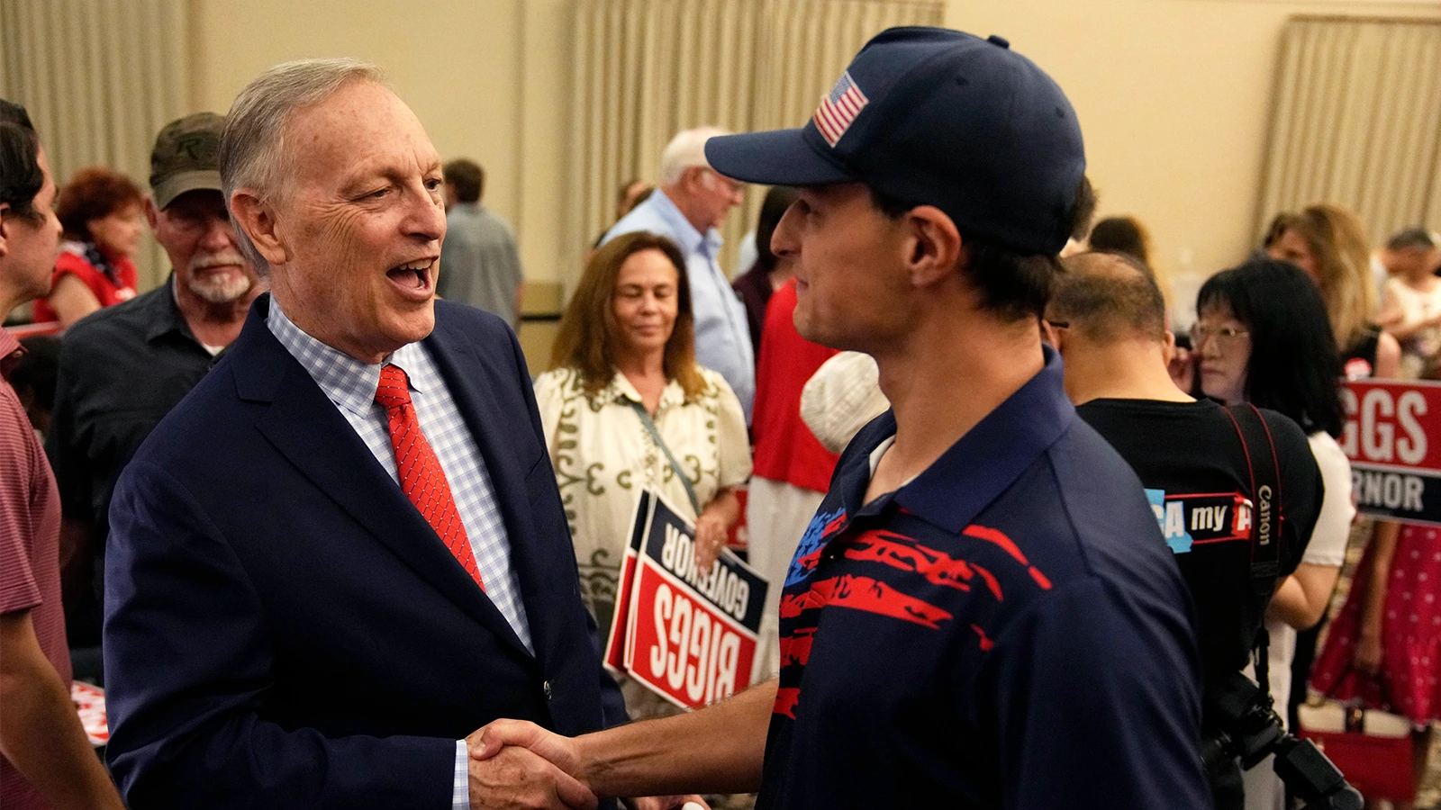 Rep. Andy Biggs shakes someone's hand