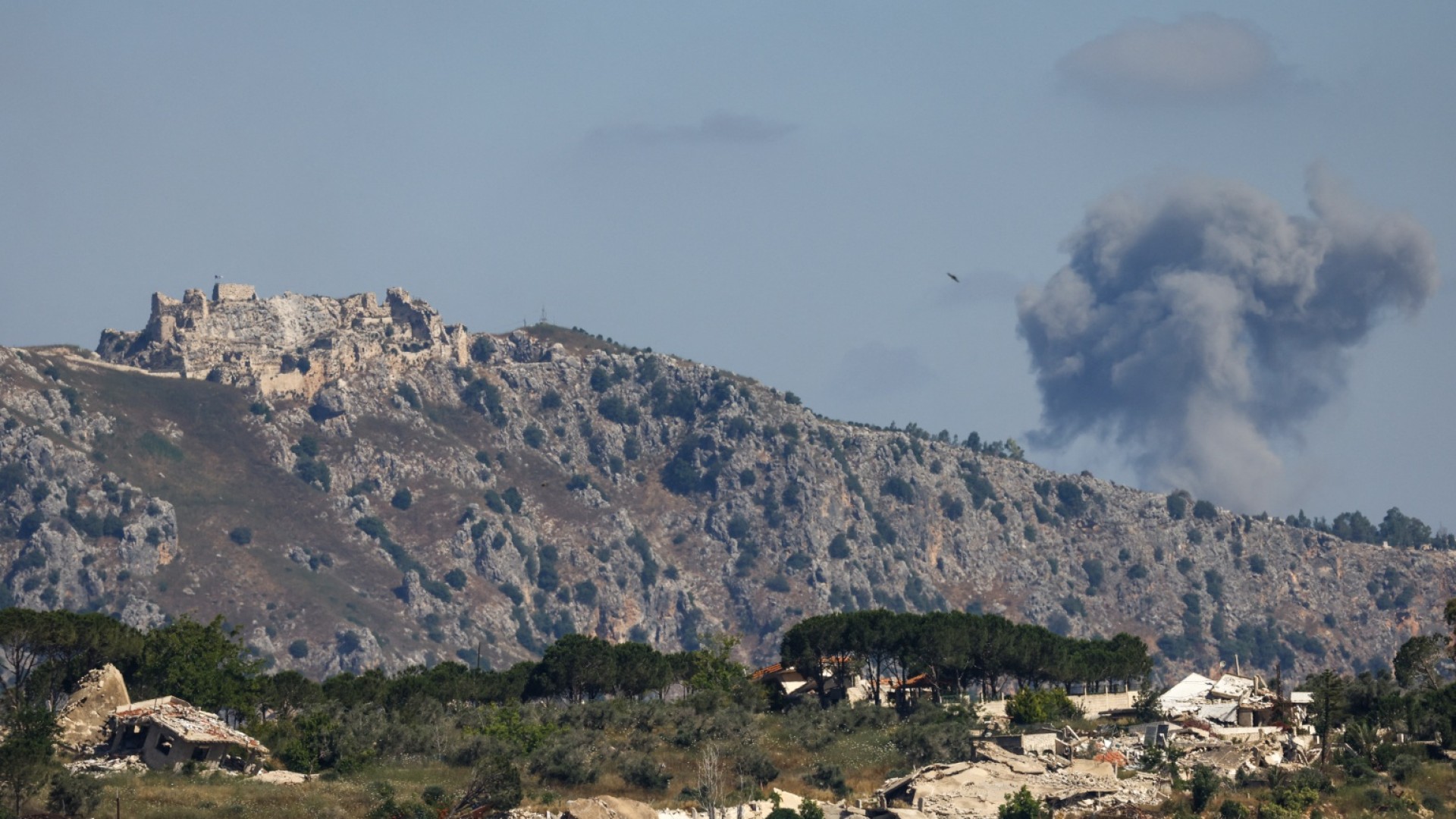 Smoke rises following Israeli bombardment in southern Lebanon close to the Beaufort Castle as seen from a position across the border in the Upper Galilee in northern Israel on June 19, 2026