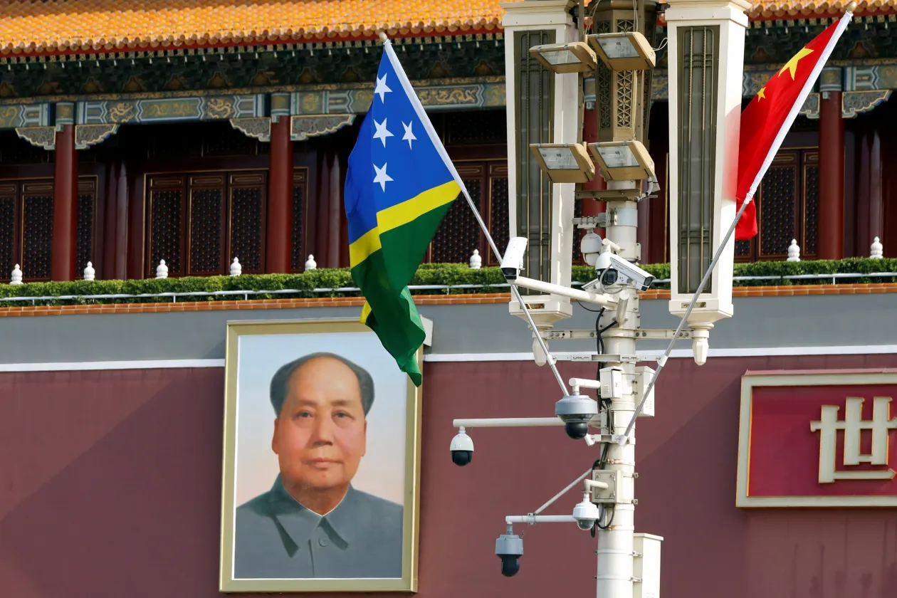 Flags of Solomon Islands and China fluttering in Beijing, July 2023