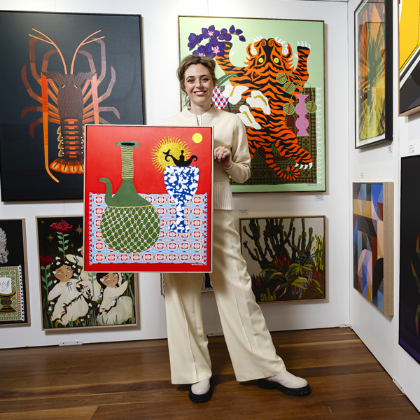 Affordable Art Fair Sydney director Georgia Huestis with a work by Nathalia Suizu