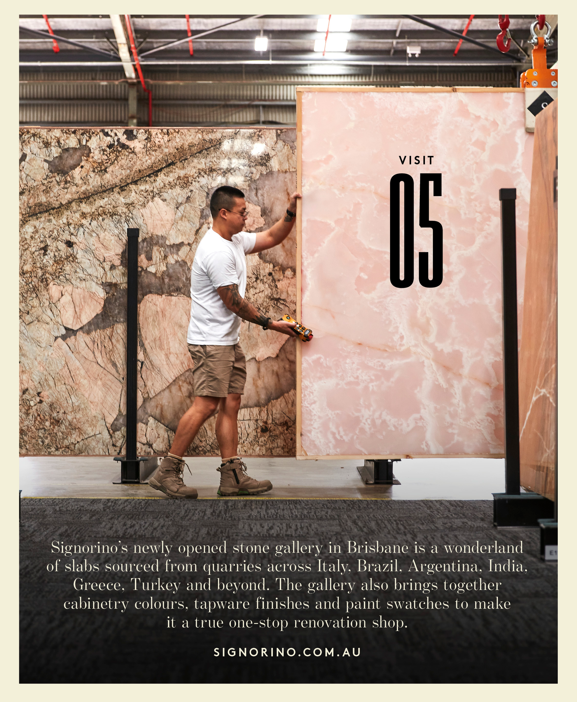 Man moving large pink slab of stone