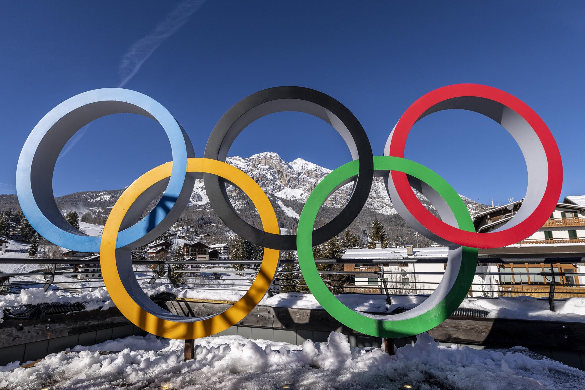 The Olympic Rings are set in front of surrounding mountains n Cortina d'Ampezzo, Italy. 