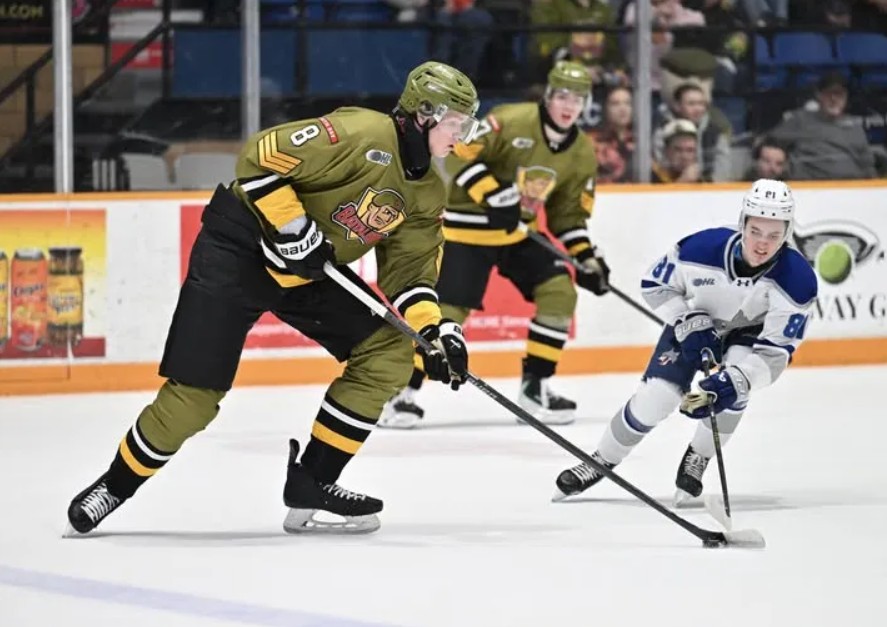 North Bay Battalion defenceman Alexander Karmanov moves with the puck during a game against Sudbury.