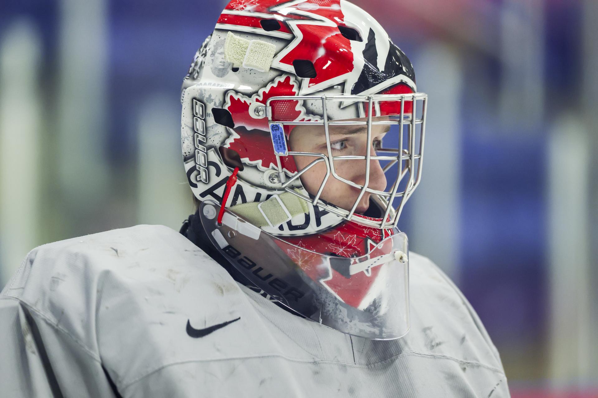 Goaltender Carter George is in full uniform during practice with the Canadian world junior hockey team.