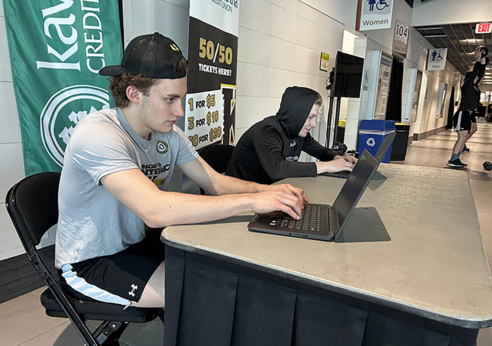 Kingston Frontenacs goalie Gavin Betts goes online before practice at Slush Puppie Place to check the schedule of his end-of-semester exams.