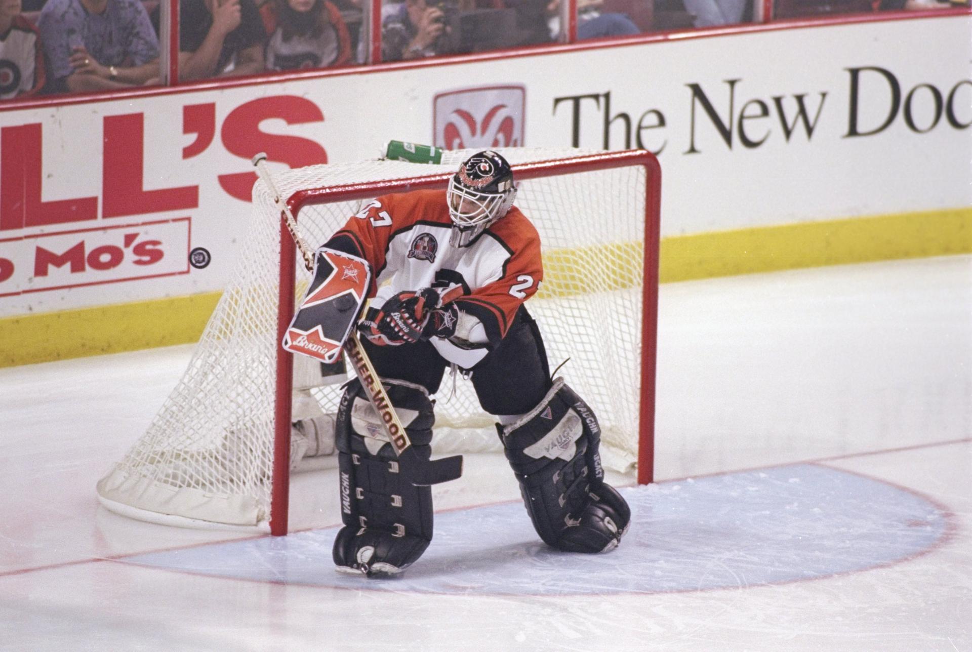 Philadelphia Flyers goaltender Ron Hextall blocks a shot during Game 1 of the 1997 Stanley Cup Finals against the Detroit Red Wings.