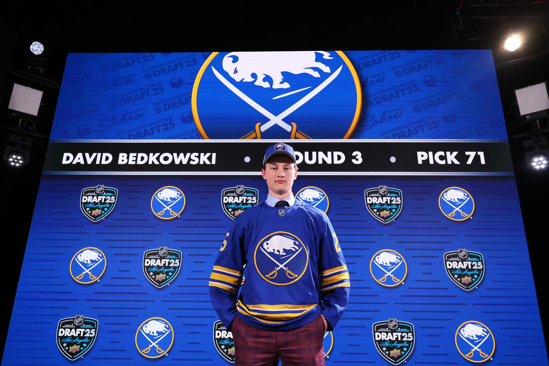 David Bedkowski poses after being drafted by the Buffalo Sabres with the 71st overall pick during rounds 2-7 of the 2025 Upper Deck NHL Draft in Los Angeles.