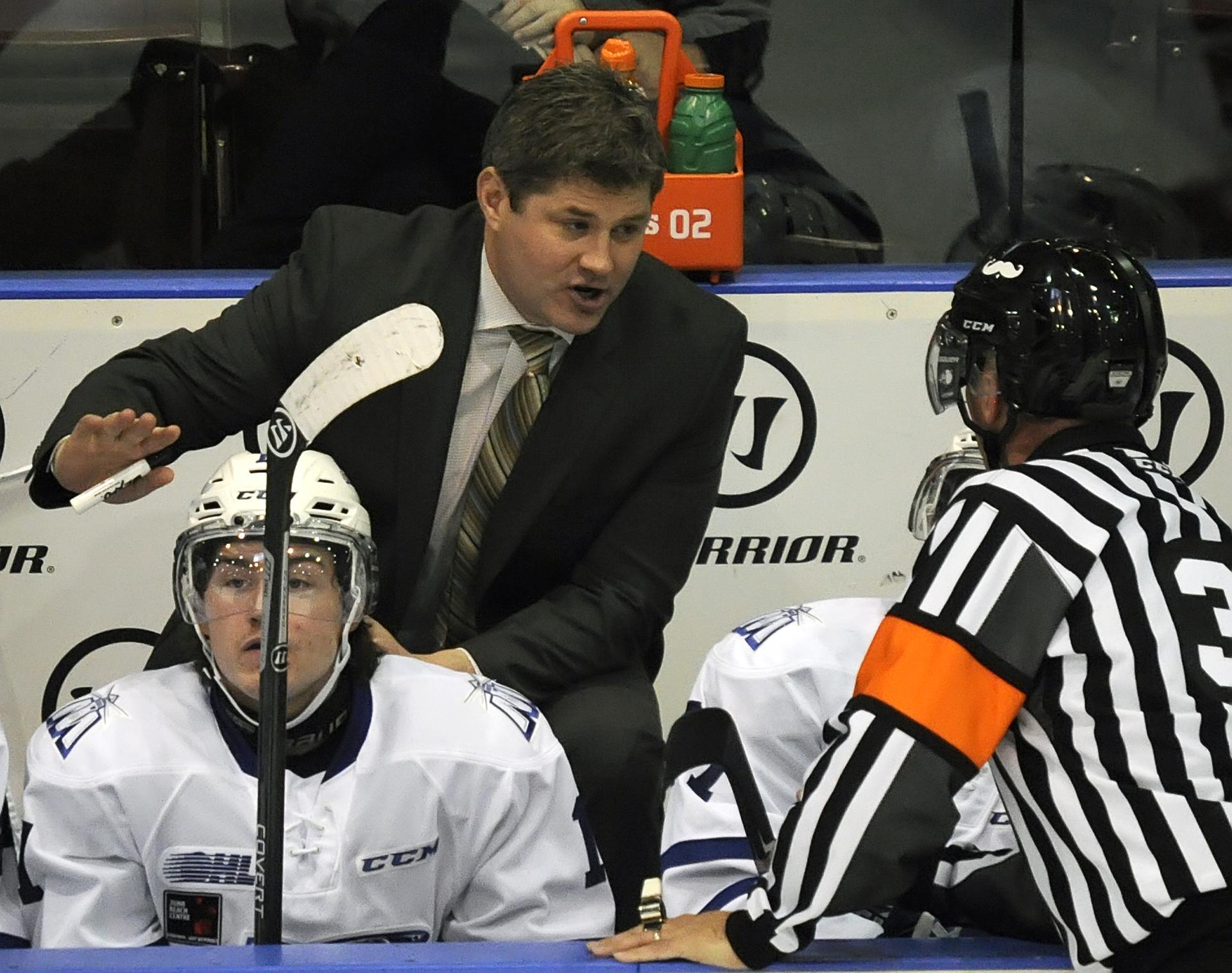 James Boyd, then head coach of the Mississauga Steelheads, discusses a call with the referee during a game in 2014.