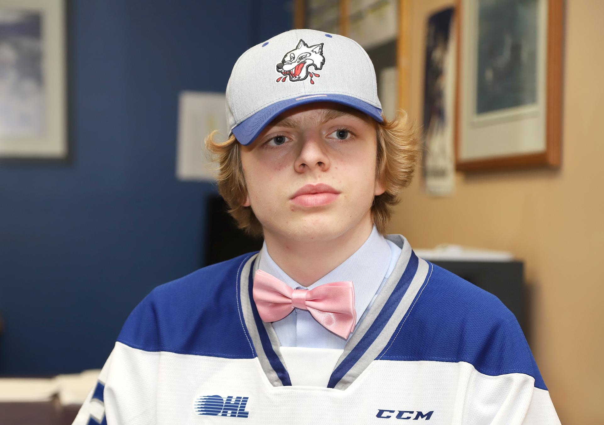 Caden Taylor, a talented forward, poses for a photographer in Sudbury after the Wolves acquired his rights in the 2023 OHL draft.