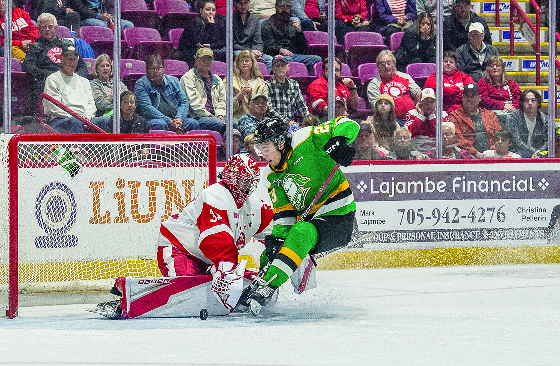 London Knights forward Sam O'Reilly drives the net in a game against the Sault Ste. Marie Greyhounds.