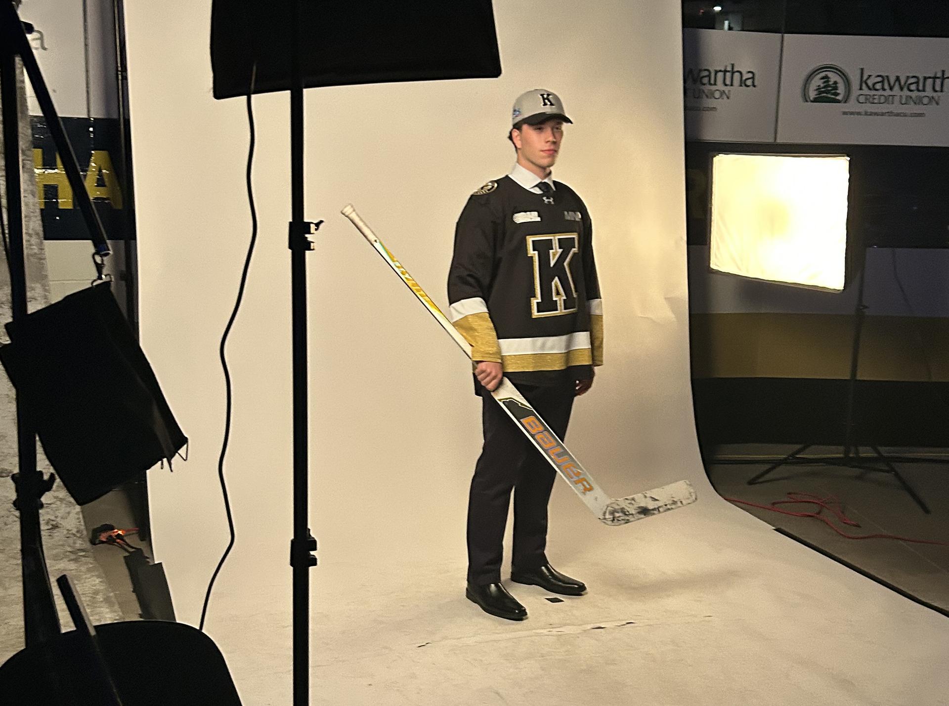 Goaltender Nathan Ferris from Belleville, Ont., poses for an OHL photographer after the Kingston Frontenacs made him their 13th-round pick at the 2026 OHL Priority Selection at Slush Puppie Place in Kingston.