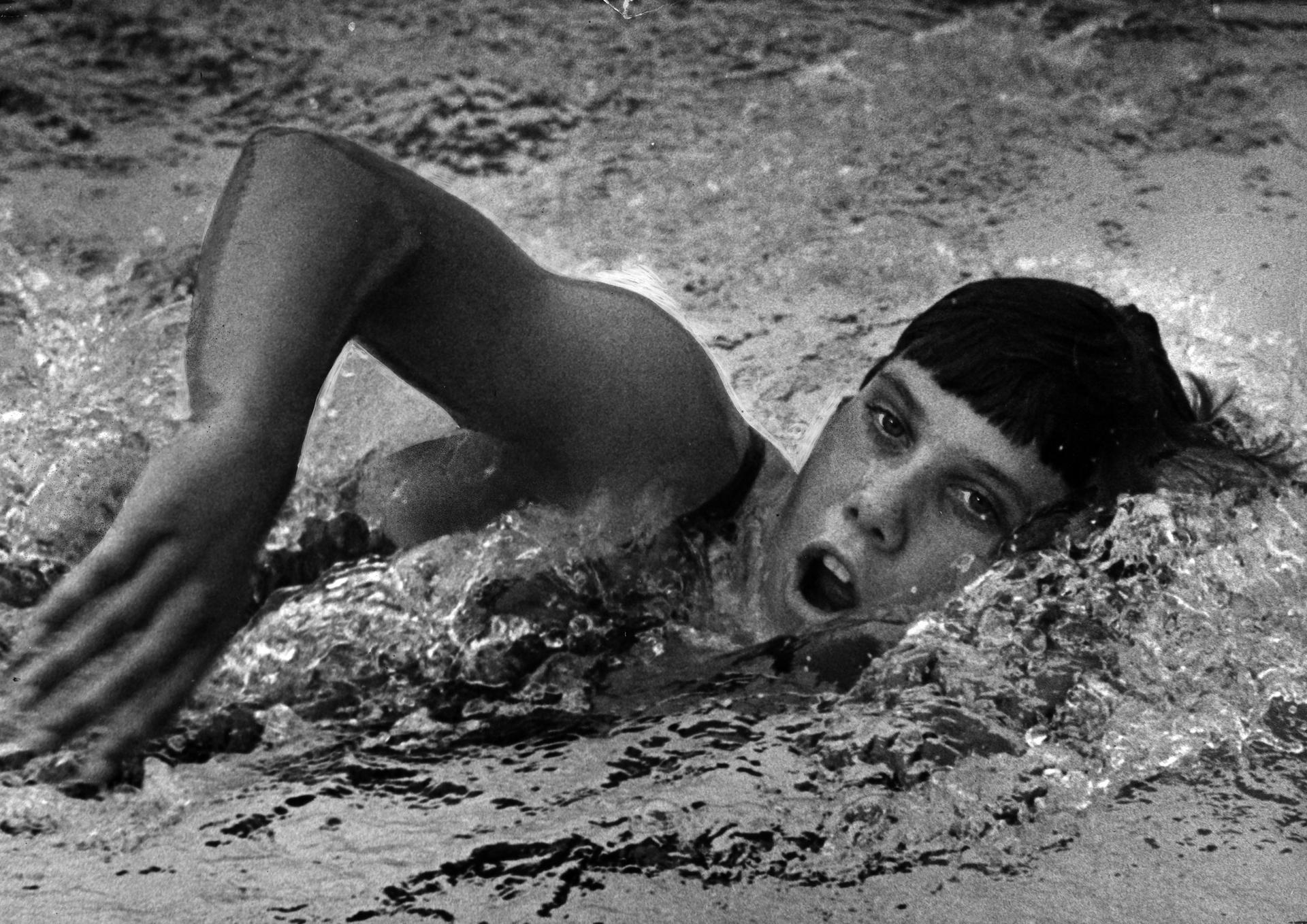 Canadian Olympic medal winner Elaine Tanner takes a breath while swimming in 1966.