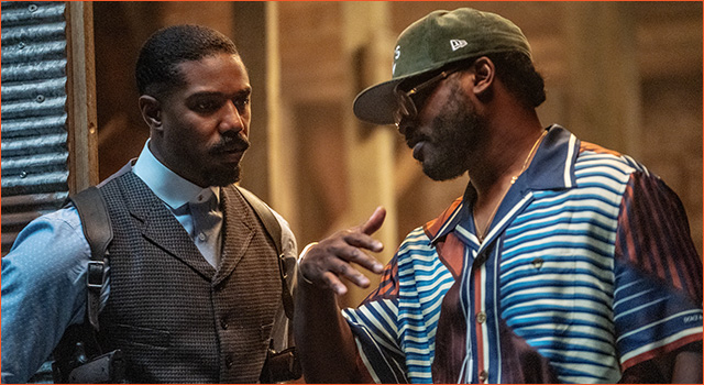Ryan Coogler speaking to Michael B. Jordan on the set of SINNERS.