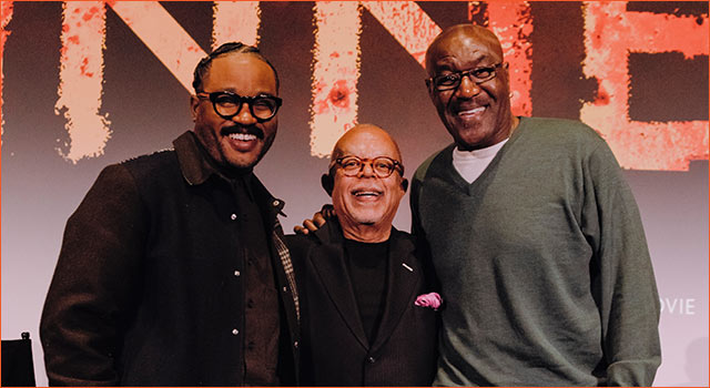 Three people smiling for a photo after discussing SINNERS.