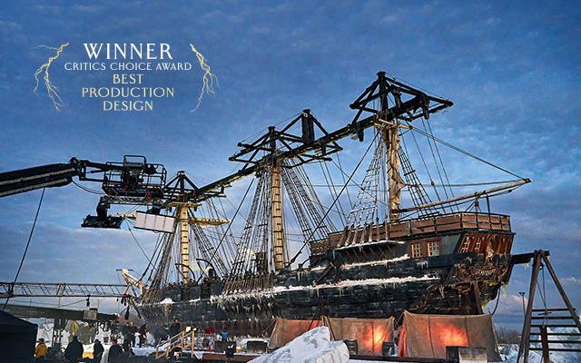 A ship set from FRANKENSTEIN. Text over reads: Winner: Critics Choice Award, Best Production Design.