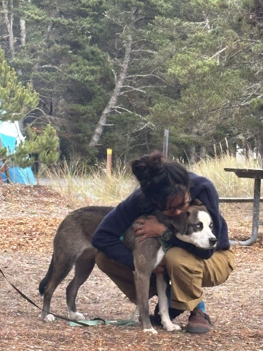 My long-suffering dog and me before the rain started. 