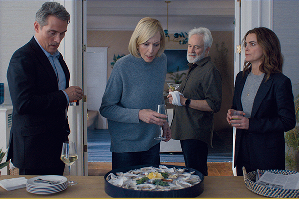 A still of four characters from THE DIPLOMAT.