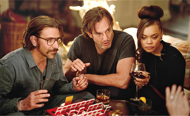 Bradley Cooper, Will Arnett, and Andra Day playing a game in IS THIS THING ON?