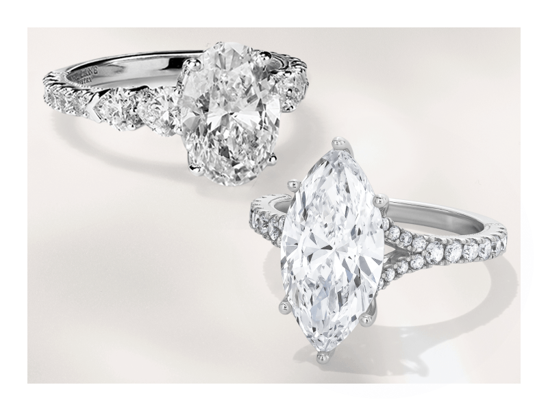 White gold oval-cut diamond engagement ring and white gold marquise-cut engagement ring.