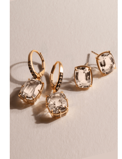 Gold drop and stud earrings with cushion-cut champagne stones; drop earrings feature dark pavé accents.