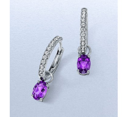 White gold drop earrings with purple amethyst gemstones and clear gemstone accents.