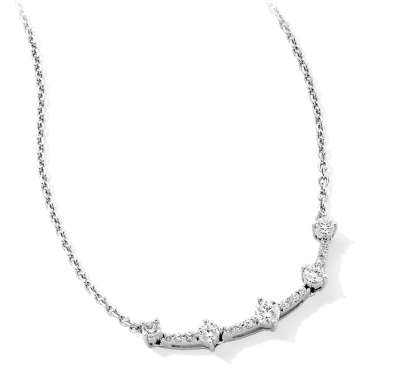 White gold necklace with round and star-shaped diamond clusters arranged along a delicate chain.