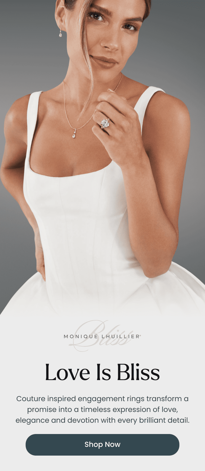 A model wearing a Monique Lhuillier bridal gown and diamond jewelry. Love is bliss. Click shop now.