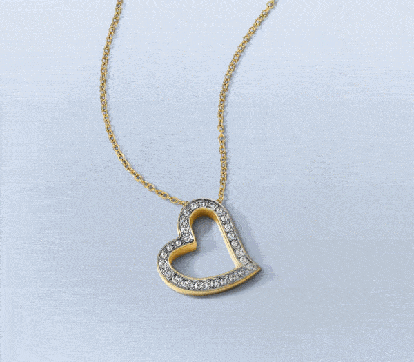 Yellow gold open-heart diamond necklace. Clover leaf necklace. Cluster pendant necklace and earrings.