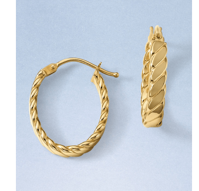 Pair of twisted yellow gold hoop earrings.