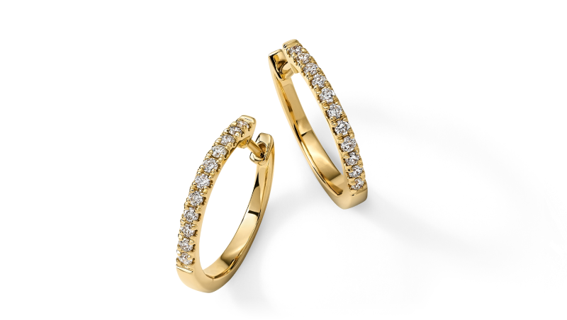 Yellow gold hoop earrings with rows of round diamonds.