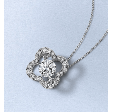 Diamond clover-shaped pendant necklace with a round center stone on a white gold chain.