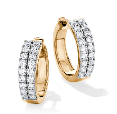 Yellow gold diamond-edged hoop earrings.