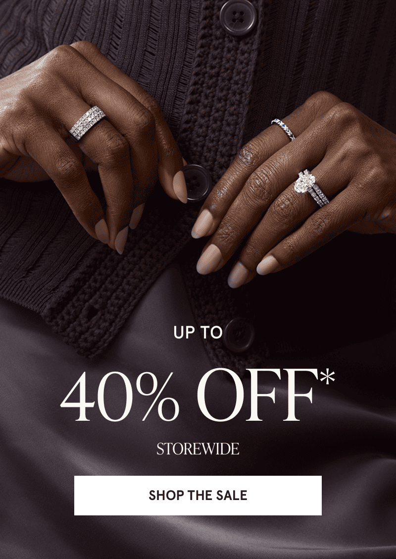 A model wearing an engagement ring and more diamond rings. Up to 40% off storewide. Click to shop the sale