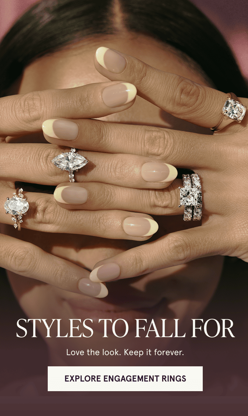 A model wearing multiple engagement rings. Styles to fall for. Click to explore engagement rings